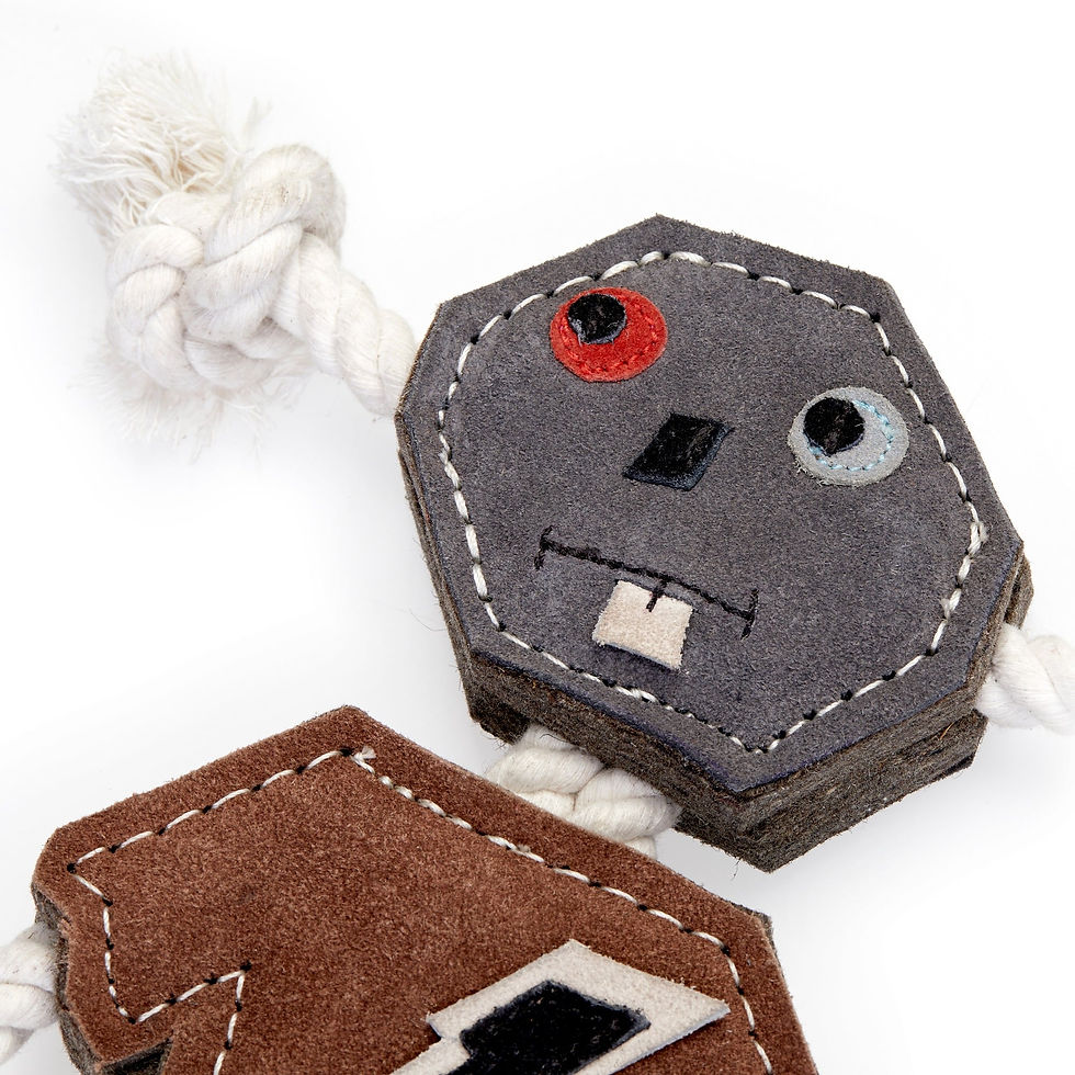 Close-up of Robot eco dog toy by Green & Wild’s made from suede, felt and jute rope