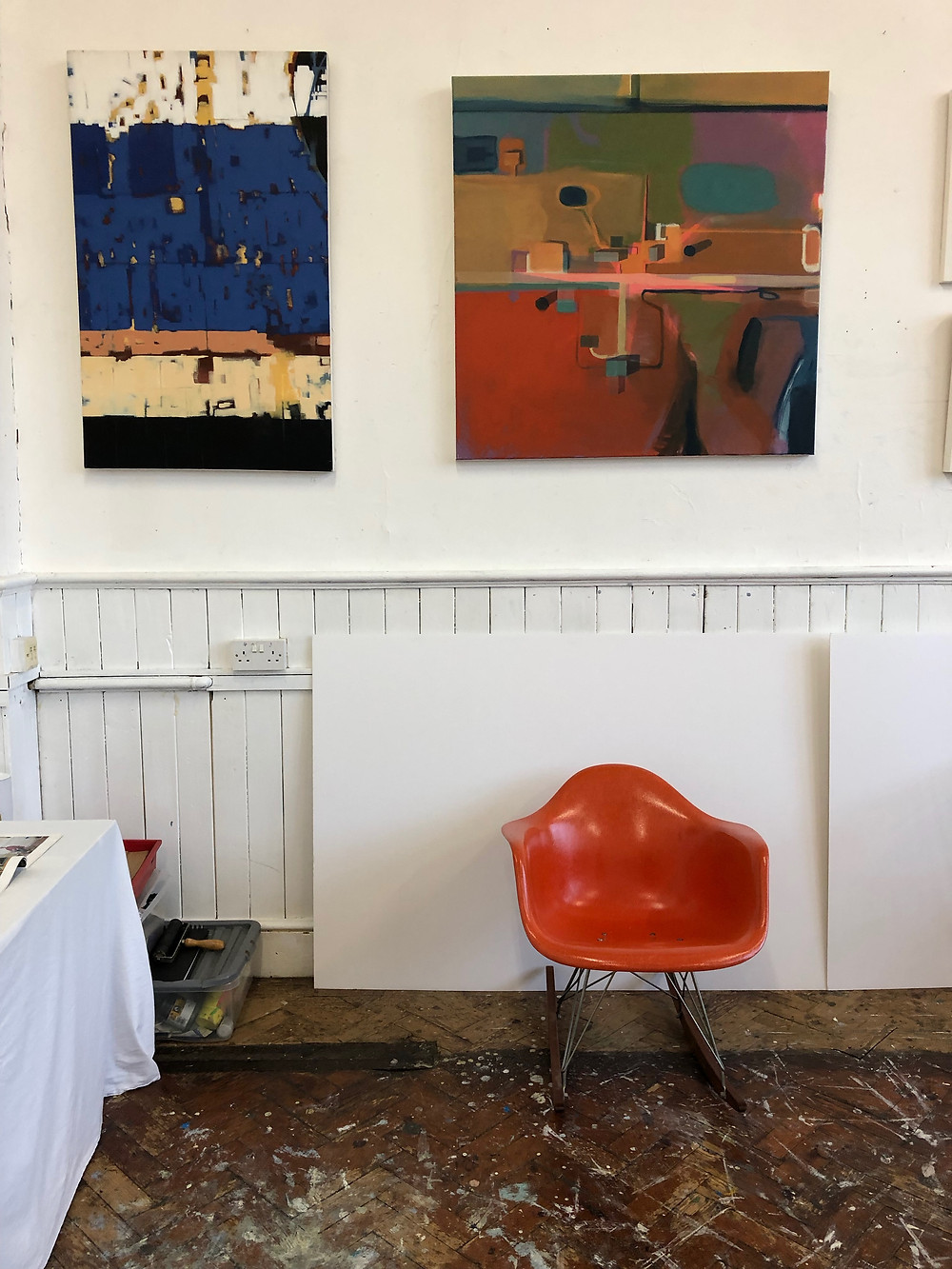 Artist's studio at Krowji in Cornwall with red Eames chair