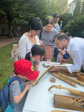 Photo of Daniel Rossi teaching about bamboo carving