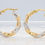 Thumbnail: 14 karat yellow white gold diamond cut hoop earrings