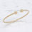 Thumbnail: 14 karat yellow gold 8mm double ball open cuff bangle