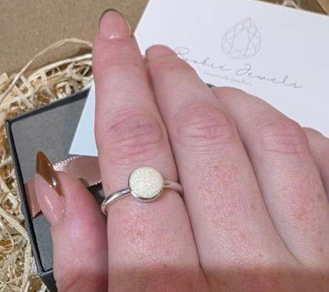 Silver breastmilk ring worn