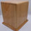 Thumbnail: back side view of carved angel compaion cremation urn