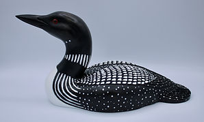 right side view of hand carved medium sized loon wood carving