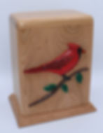 hand- carved red cardinal wooden cremation urn