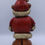 Thumbnail: back view of wood carved santa bear