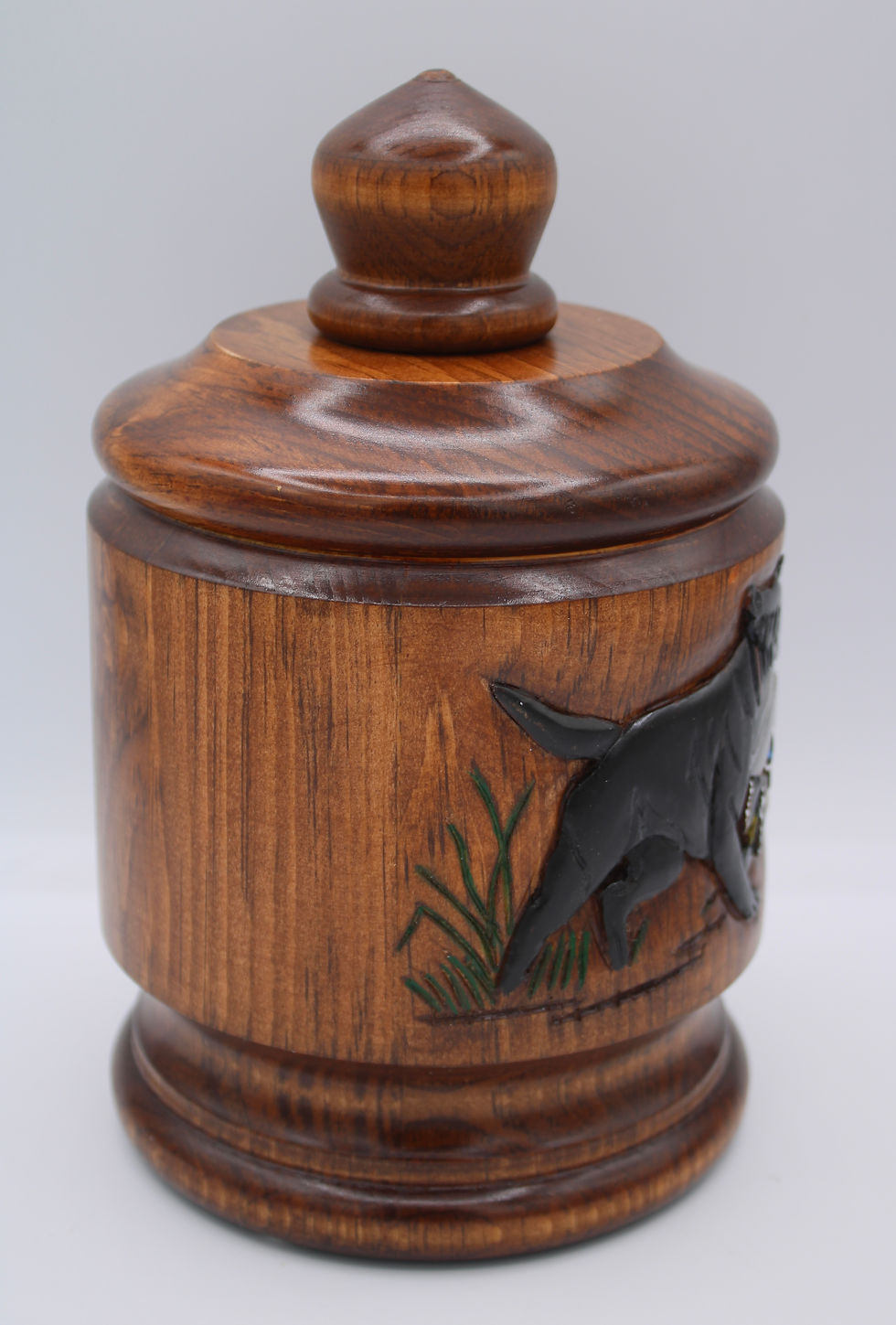 Thumbnail: hand carved Labrador Dog cremation urn in pinewoodright side view of carved dog