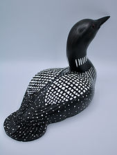 back view of hand carved medium sized loon wood carving