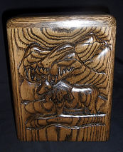 Hand carved Moose cremation urn in oak wood