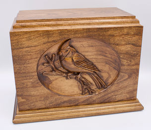 Hand- carved Cardinal cherry cremation urn