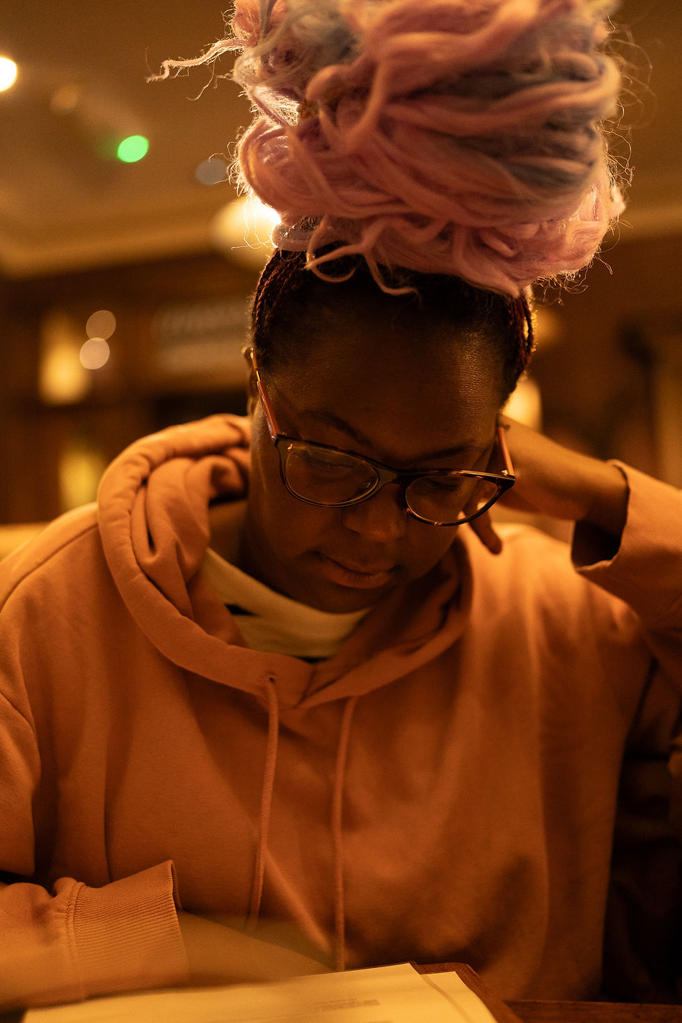 irst photo of Emma by the fire in a North Wales pub — same settings but changed white balance to compare warmth and tone