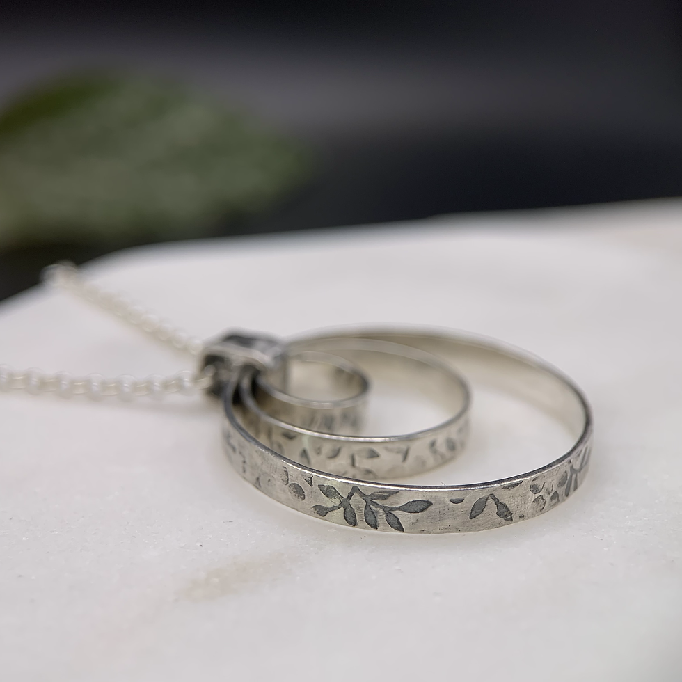 Thumbnail: Silver pendant 3 circles of flowers