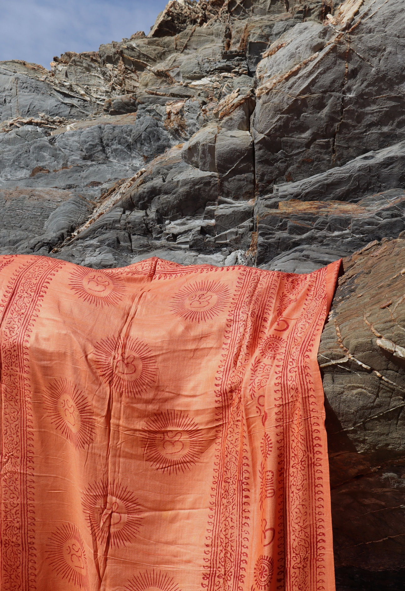 ‘orange’ om sarong 