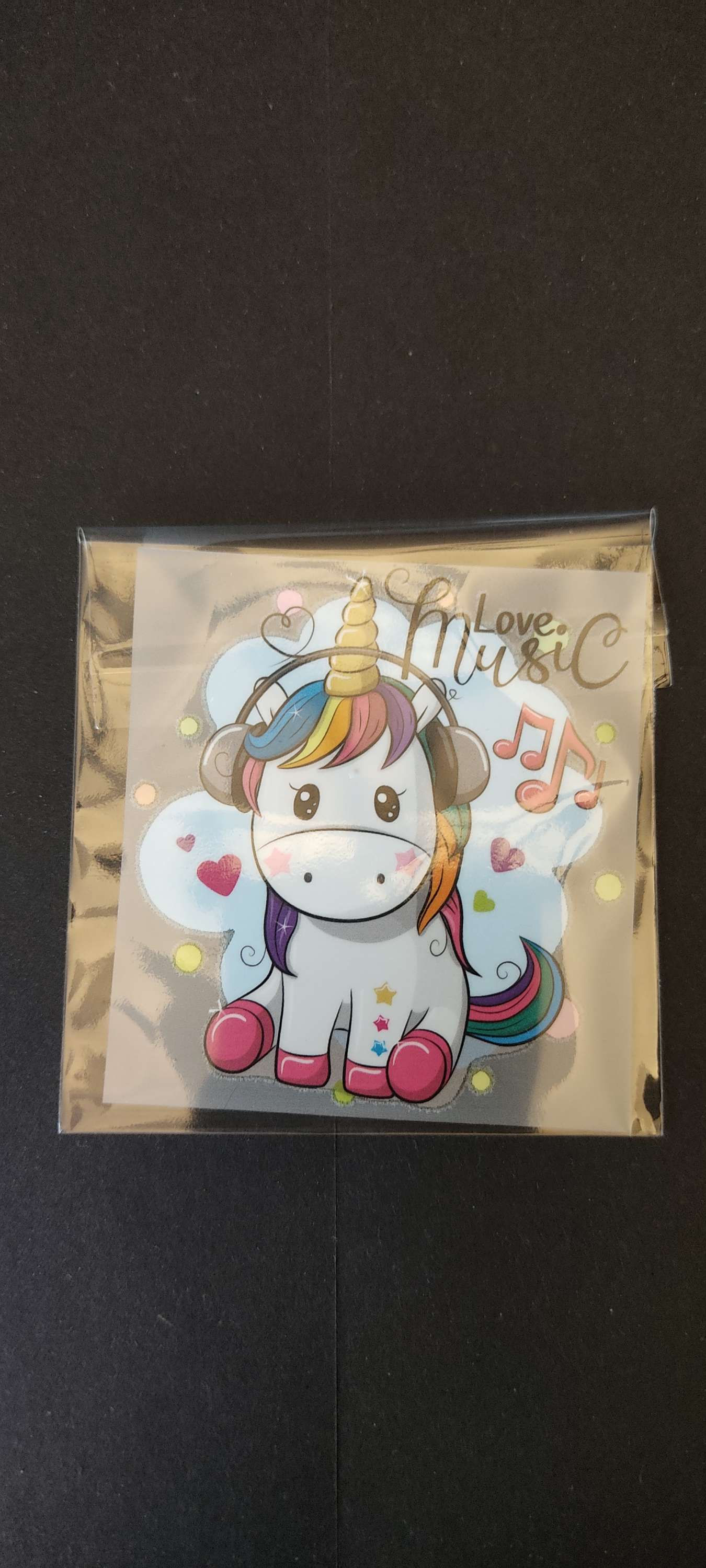 Thermocollant licorne et ses écouteurs 6cmx6.5cm