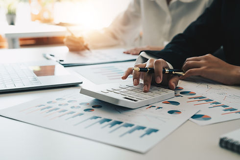 accountant-working-on-calculator-to-calculate-busi-2022-08-18-20-22-52-utc.jpg