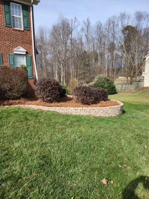 retaining wall with fresh pine needles