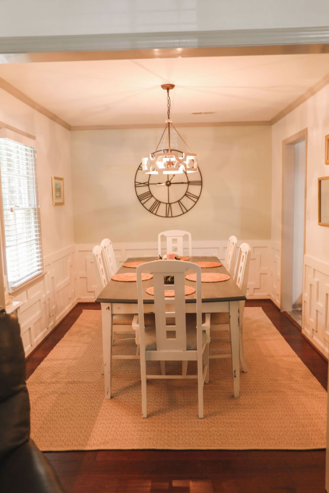 Chandelier above table 