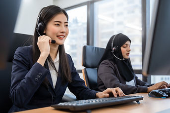 happy-smiling-asian-woman-call-center-operator-wearing-headsets-working-computer-talking-w