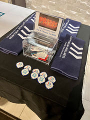 Table with Custom Printed Golf Towels and Poker Chips