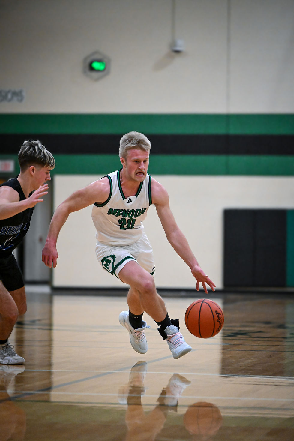 Owen Gorham drives in the paint Tuesday night Photo by Chris Carpenter | Team TBM
