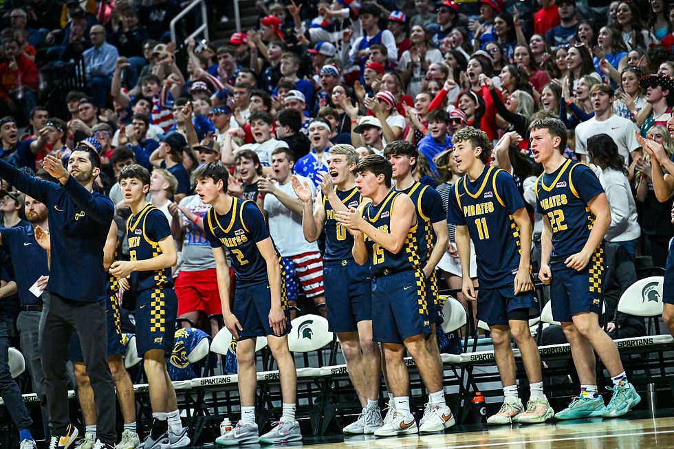 Pewamo-Westphalia's bench celebrates after a big play saturday. Photo by Chris Carpenter.
