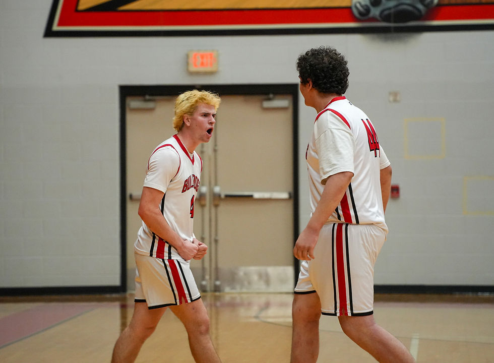 Mitch Beyer Celebrates with Teammate Peyton Hudgins after beating schoolcraft Tuesday night. Picture by Travis Long | TBM Team