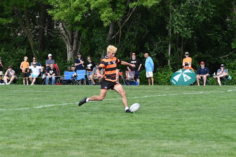 Rockford's Senior Fly-Half, Terak Petersen kicks in the last 2-points of Regulation Photo Credited to Sal Madonna