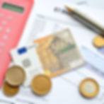 European finance which is showing bank statement, a credit card in euro, a check, some co