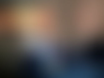 Private couples massage room with two massage tables, dim lighting, and a calm spa atmosphere at Refresh Massage Mississauga.