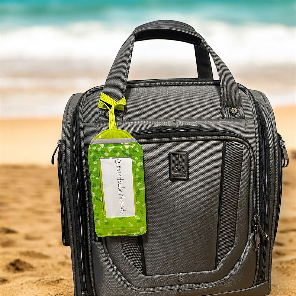 Custom made luggage tag on a carryon suitcase.