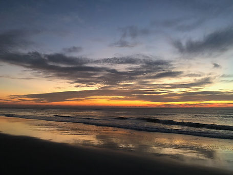 Sunset over a calm beach