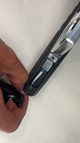 Gif of someone disconnecting the battery harness on a Field One Force