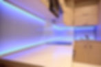 Modern luxury kitchen with purple LED lighting