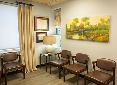 Grace Dental waiting area: comfortable seating and calming artwork