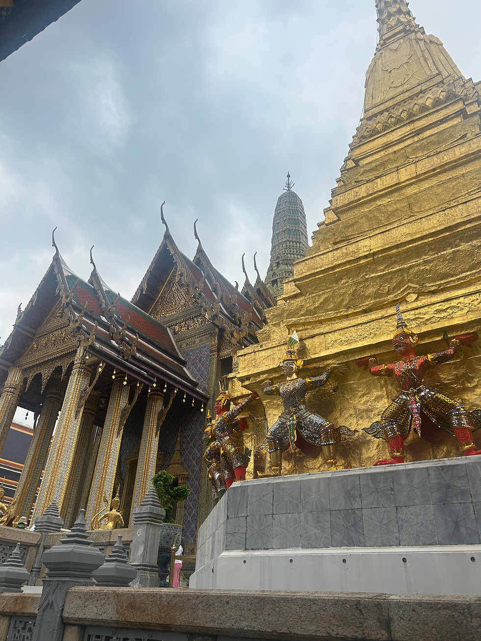 The Royal Pantheon in the background enshrines the statues of the eight Kinks of the Chakri dynasty. In the foreground is one of the two Golden Chedis surrounded by mythical creatures.  These were builds to honor King Rama I’s father and mother.