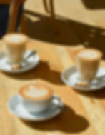 Coffees with latte art