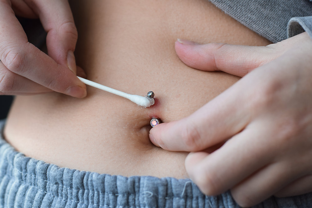 How to Take Care of an Infected Belly Piercing? Steps to Heal Safely