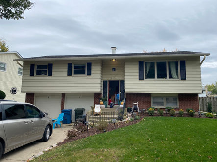 Aluminum siding hail damage approved through homeowners insurance claim through TomKat Restoration