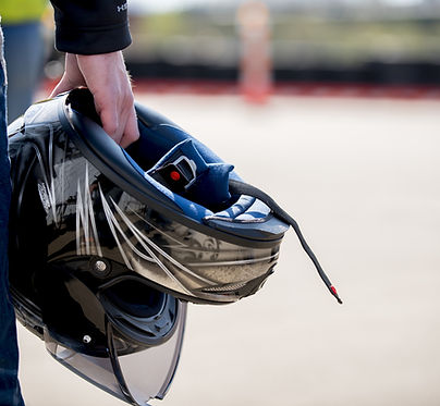 closeup-shot-of-a-male-holding-his-motorcycle-helm-2023-11-27-04-55-02-utc.jpeg