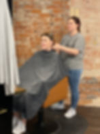 Yoga students stretching during Gentle Express Yoga at Heady Heart Healing Arts Yoga Studio in Yankton, South Dakota