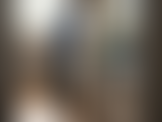 Cleaner wiping countertop in new home kitchen