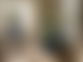 Cleaning crew clearing post-construction debris indoors