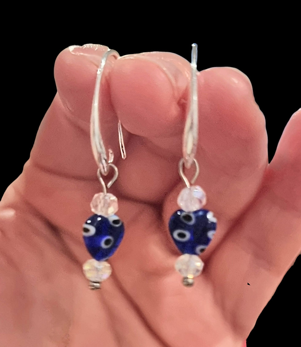 Thumbnail: Blue lampwork glass evil eye heart drop earrings on silver hooks