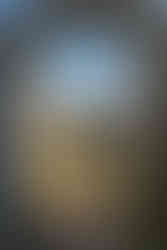 Durch ein Steintor wird der Blick in die weite Ferne gelenkt. Detail Löwenburg.