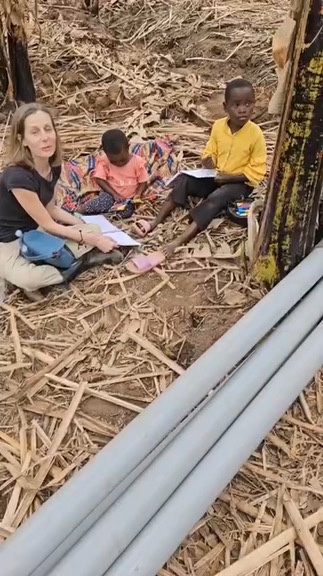 Kelly and kids at a well site