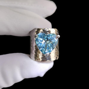 White gold ring with Swiss blue topaz in the shape of a heart