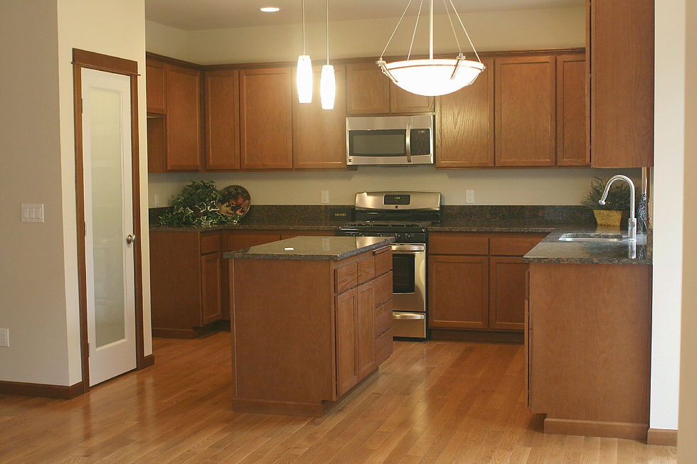 Large Open Kitchen with Slab Granite