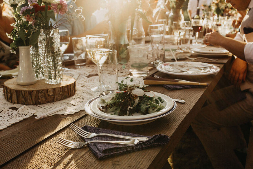 A table set with vintage dinnerware