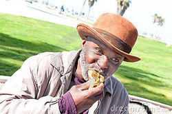 elderly-man-eating-hotdog-18986477