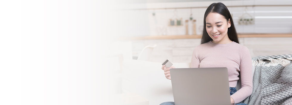 smiley-woman-shopping-online-with-laptop